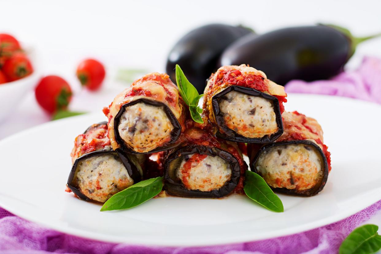 Eggplant (aubergine) rolls with meat in tomato sauce