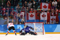 <p>Madeline Rooney #35 of the United States makes a save against Brianne Jenner #19 of Canada in the overtime penalty-shot shootout during the Women’s Gold Medal Game on day thirteen of the PyeongChang 2018 Winter Olympic Games at Gangneung Hockey Centre on February 22, 2018 in Gangneung, South Korea. (Photo by Jamie Squire/Getty Images) </p>