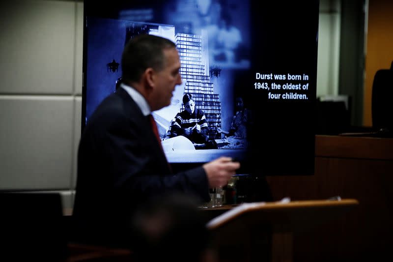 Deputy District Attorney John Lewin shows a photo of Robert Durst as a young man during opening statements in the murder trial in Los Angeles