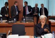 International Monetary Fund Managing Director Christine Lagarde waits for the beginning of a Eurozone finance ministers meeting in Brussels, Belgium June 27, 2015. REUTERS/Philippe Wojazer