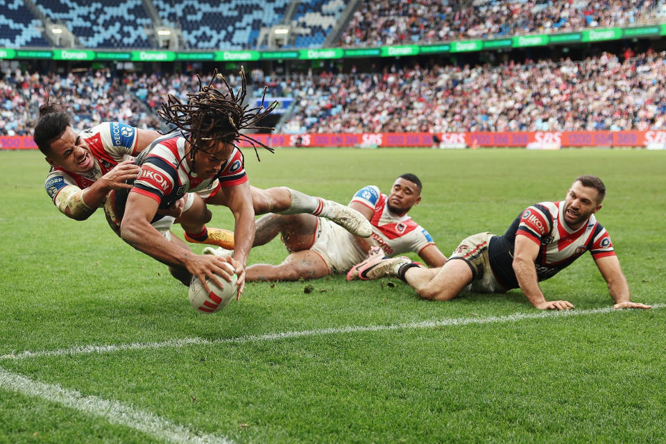 Dominic Young of the Sydney Roosters scores a try against the St. George Illawarra Dragons. (Cameron Spencer/Getty Images)