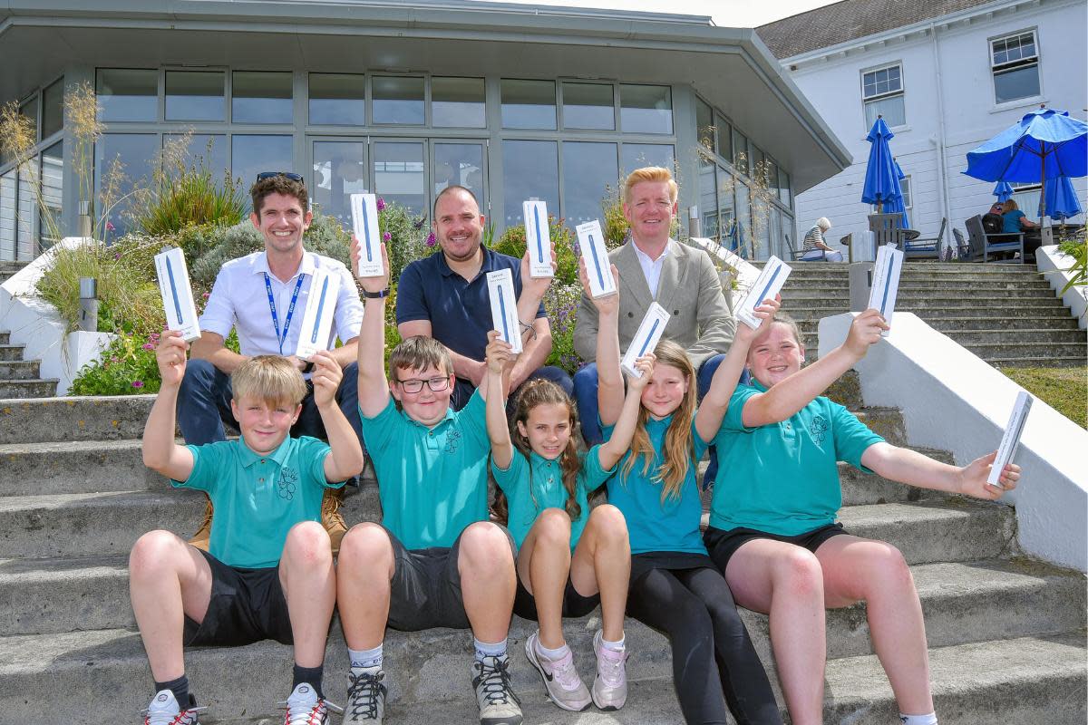 Mullion Primary School visit Hotel Polurrian and celebrate donation of 80 stylus pens <i>(Image: Liz Lean PR)</i>