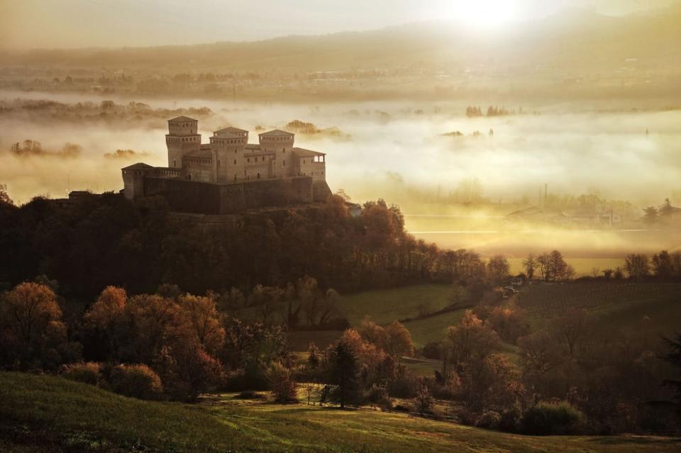 <div class="inline-image__caption"><p>Castello di Torrechiara on hill at sunrise, Parma, Italy.</p></div> <div class="inline-image__credit">Getty Images</div>