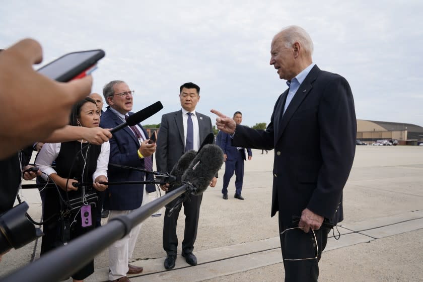 President Joe Biden talks to the media before he and first lady Jill Biden board Air Force One, Wednesday, June 9, 2021, at Andrews Air Force Base, Md. Biden is embarking on the first overseas trip of his term, and is eager to reassert the United States on the world stage, steadying European allies deeply shaken by his predecessor and pushing democracy as the only bulwark to the rising forces of authoritarianism. (AP Photo/Patrick Semansky)