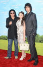 Gene Simmons, Tracy Tweed, and Nick Simmons arrive at the Los Angeles premiere of "That's My Boy" on June 4, 2012.