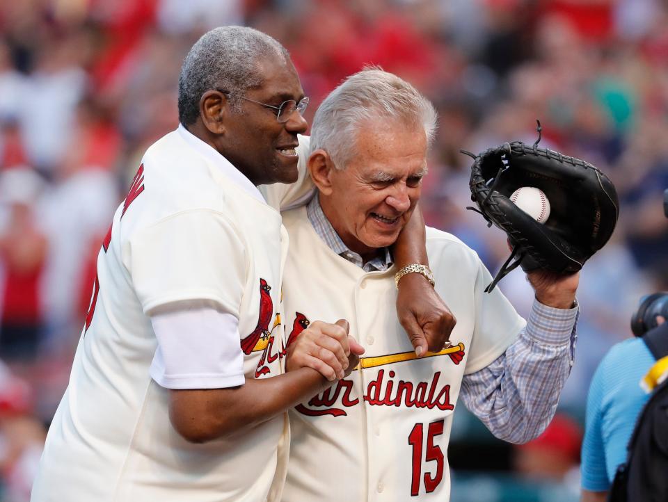 FILE - In this May 17, 2017, file photo, Bob Gibson, left, and Tim McCarver, members of the St. Louis Cardinals' 1967 World Series championship team, take part in a ceremony honoring the 50th anniversary of the victory, before a game between the Cardinals and the Boston Red Sox in St. Louis. Gibson is fighting pancreatic cancer. The St. Louis Post-Dispatch said the 83-year-old Hall of Famer was diagnosed with the cancer several weeks ago and revealed the news Saturday, July 13, 2019, to the other living Hall of Famers. (AP Photo/Jeff Roberson, File)