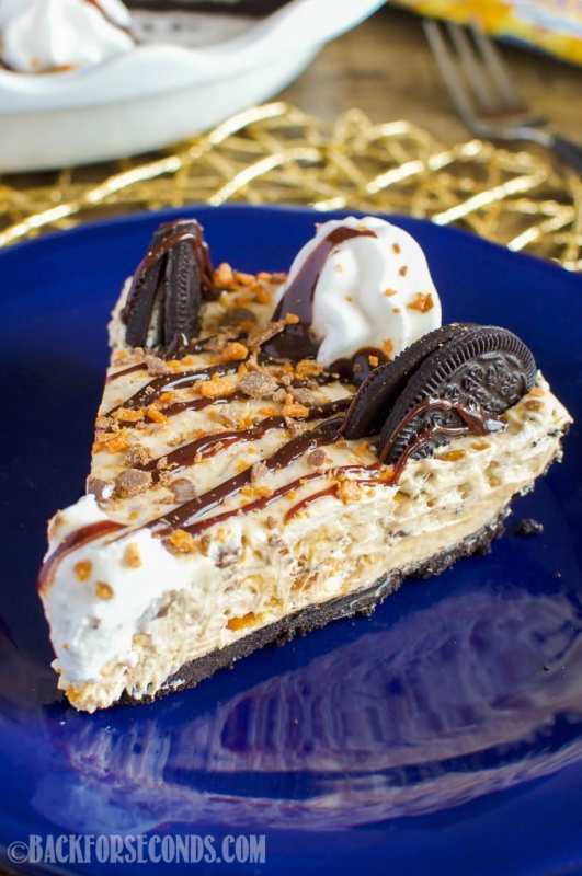 <p>Back for Seconds</p><p>No-Bake Butterfinger Cheesecake Pie with an Oreo crust is out of this world delicious! An easy, impressive dessert recipe that always gets rave reviews! </p><p><strong>Get the recipe: </strong><strong><a href="https://backforseconds.com/no-bake-butterfinger-cheesecake-pie/" rel="nofollow noopener" target="_blank" data-ylk="slk:No-Bake Butterfinger Cheesecake Pie;elm:context_link;itc:0;sec:content-canvas" class="link ">No-Bake Butterfinger Cheesecake Pie</a></strong></p>