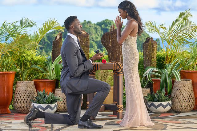 <p>Craig Sjodin/abc</p> Dotun Olubeko proposes to Charity Lawson during the finale of 'The Bachelorette' Aug. 21, 2023