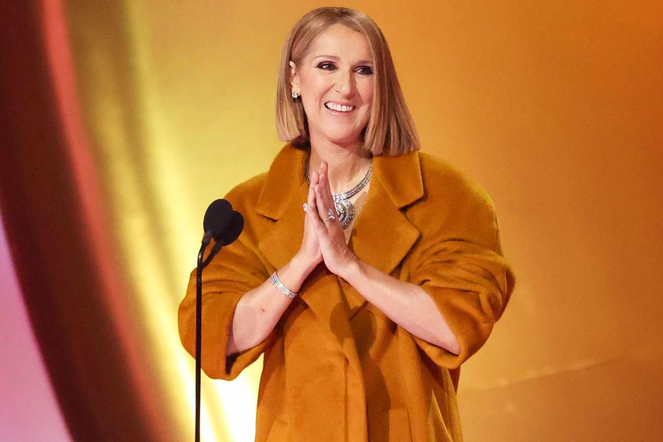 <p>Christopher Polk/Billboard via Getty</p> Celine Dion presenting at the Grammys in Los Angeles in February 2024