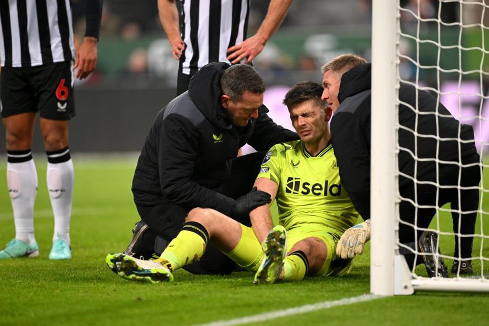 Nick Pope was in clear pain after suffering a shoulder injury against Manchester United at St James' Park (Getty Images)