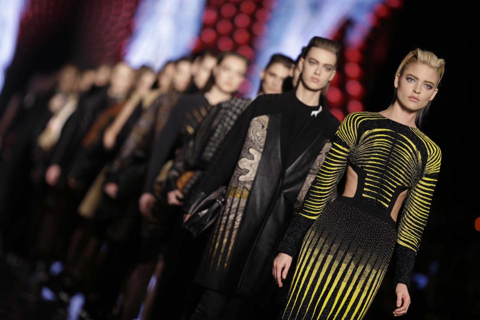 Models wear creations for Etro women's Fall-Winter 2013-14 collection, part of the Milan Fashion Week, unveiled in Milan, Italy, Friday, Feb. 22, 2013. (AP Photo/Luca Bruno)
