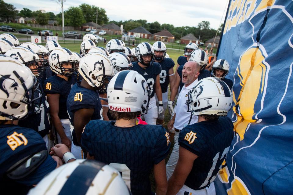 St. James players get pumped up before taking the field at St. James School in Montgomery, Ala., on Friday, Sept. 2, 2022. St. James leads Prattville Christian 27-0 at halftime.