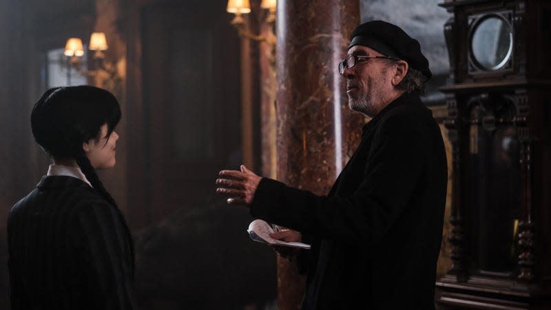 Jenna Ortega as Wednesday Addams and Director Tim Burton on set