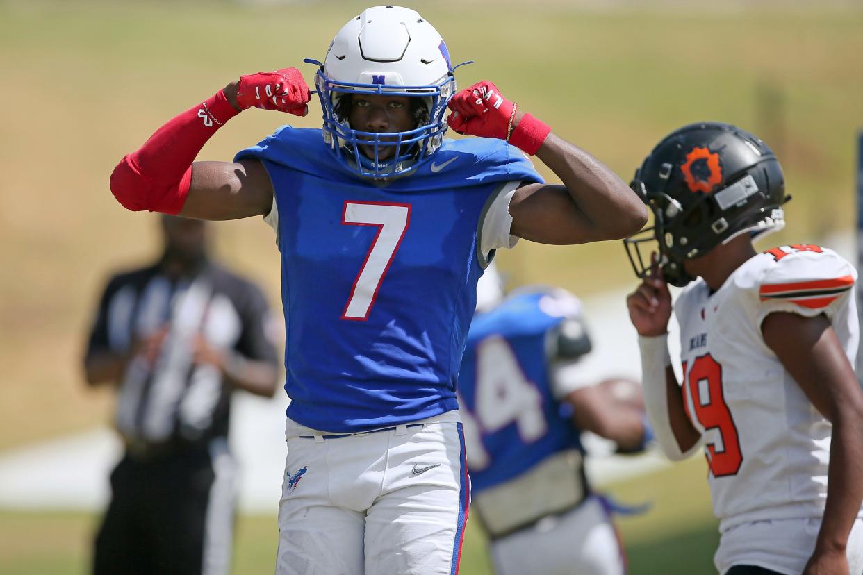 Millwood's Jaden Nickens celebrates after a touchdown during the Soul Bowl football game against Douglass on Sept. 9.