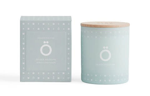 <p><a rel="nofollow noopener" href="http://skandinavisk-usa.com/collections/scented-candles/products/o-scented-candle-island" target="_blank" data-ylk="slk:Ö Scented Candle (Island);elm:context_link;itc:0;sec:content-canvas" class="link "><u>Ö Scented Candle (Island)</u></a>, $48.</p>