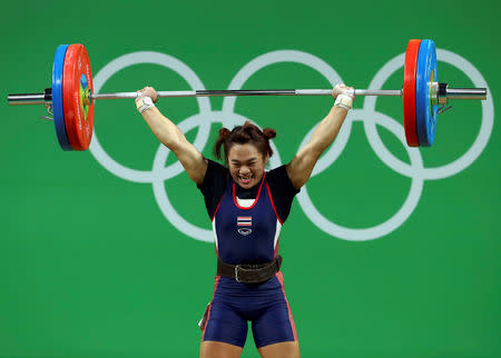 FILE PHOTO: 2016 Rio Olympics - Weightlifting - Final - Women's 58kg - Riocentro - Pavilion 2 - Rio de Janeiro, Brazil - 08/08/2016. Sukanya Srisurat (THA) of Thailand competes. REUTERS/Yves Herman