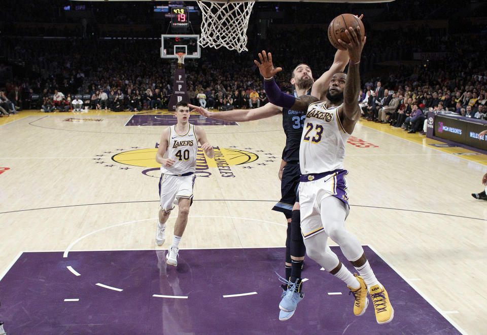 LeBron James wears several hats. (AP Photo/Marcio Jose Sanchez)