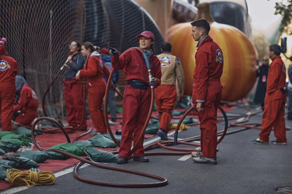 Workers inflate helium balloons for the Macy's Thanksgiving Day Parade on Wednesday, Nov. 23, 2022, in New York. (AP Photo/Andres Kudacki)