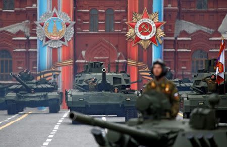 Russian servicemen parade with tanks during the 72nd anniversary of the end of World War II on the Red Square in Moscow. REUTERS/Maxim Shemetov