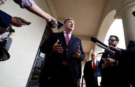 U.S. Navy SEAL Special Operations Chief Edward Gallagher's defense attorney, Timothy Parlatore, speaks with reporters in San Diego at a pre-trial hearing for Gallagher who was charged with war crimes in Iraq, in San Diego, U.S. May 22, 2019. REUTERS/Earnie Grafton