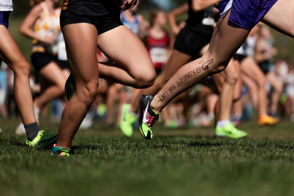 Racers compete in the championship girls race at the Border Wars XC meet at Sugar House Park in Salt Lake City on Saturday, Sept. 16, 2023. | Spenser Heaps, Deseret News