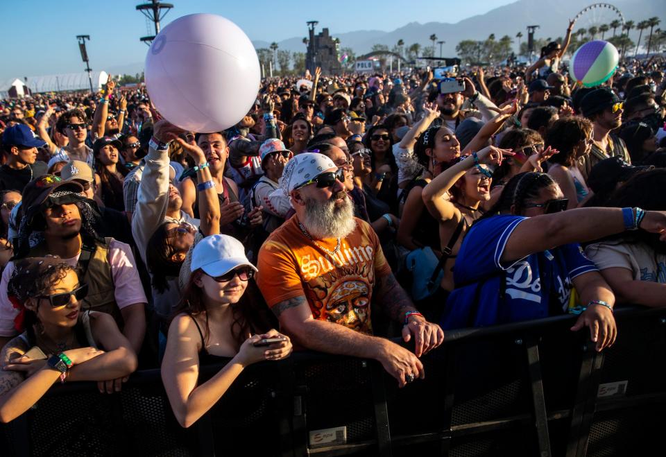 Festivalgoers listen to Sublime perform on the Coachella Stage during the Coachella Valley Music and Arts Festival in Indio, Calif., Saturday.