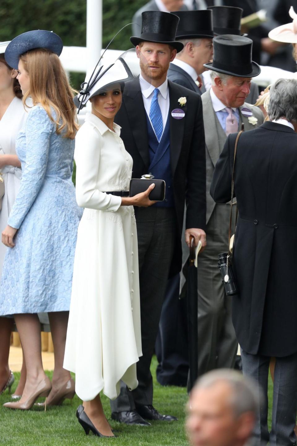 The couple, who were married a month ago, stood arm-in-arm together after arriving at the event (Getty Images)