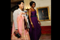 <b>October 2011</b> <br>Michelle walks with South Korea's First Lady Kim Yoon-Ok in an appropriate dress by Korean-American designer Doo-Ri Chung.