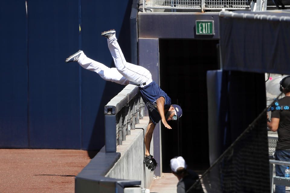 Rays outfielder Manuel Margot makes an acrobatic catch to end the second inning of ALCS Game 2. (Photo by Sean M. Haffey/Getty Images)