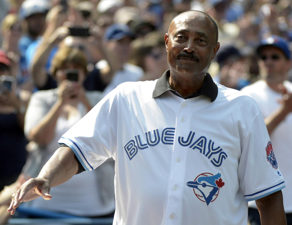 FILE - Cito Gaston, manager of the 1992 and 1993 World Series-winning Toronto Blue Jays teams acknowledges the crowd on the 25th anniversary of their back-to-back championships before a baseball game against the Tampa Bay Rays, Aug. 11, 2018, in Toronto. Gaston, Jim Leyland, Lou Piniella and Davey Johnson are among eight men on the ballot for the Hall of Fame’s contemporary era committee for managers, executives and umpires that meets on Dec. 3, 2023, at the winter meetings in Nashville, Tenn. (Jon Blacker/The Canadian Press via AP, File)