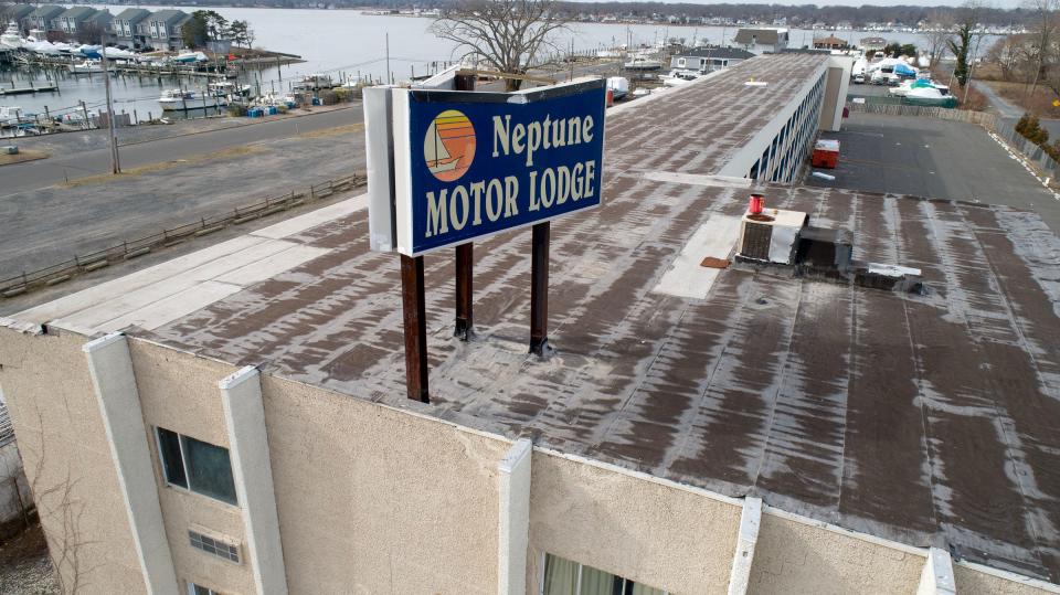 A new roof covers the former Neptune Motor Lodge on New York Avenue in Neptune Monday, February 7, 2023.  The structure has sat abandoned since March 2021, when a powerful storm tore off parts of the roof from the motel.