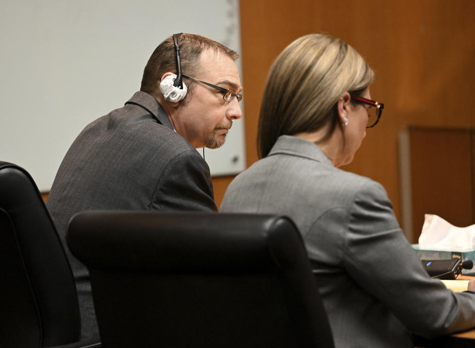 James Crumbley and his attorney Mariell Lehman listen to the verdict in Oakland County Court in Pontiac, Mich., Thursday, March 14, 2024. Crumbley, the father of a Michigan school shooter, was found guilty of involuntary manslaughter, a second conviction against the teen’s parents who were accused of failing to secure a gun at home and doing nothing to address acute signs of his mental turmoil. (Robin Buckson/Detroit News via AP, Pool)