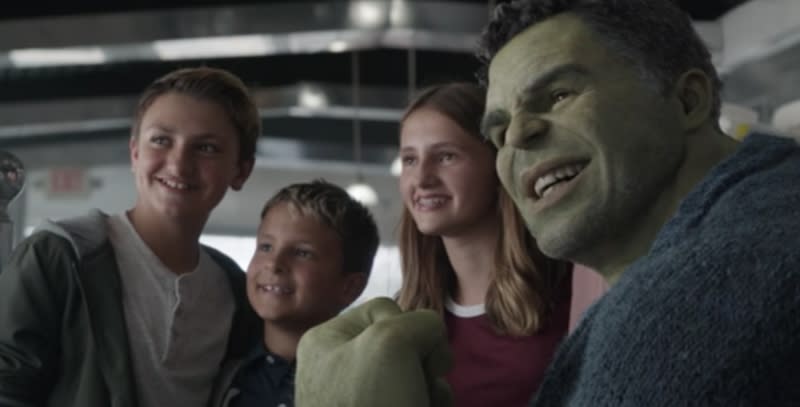 Professor Hulk surrounded by some tiny Avengers groupies