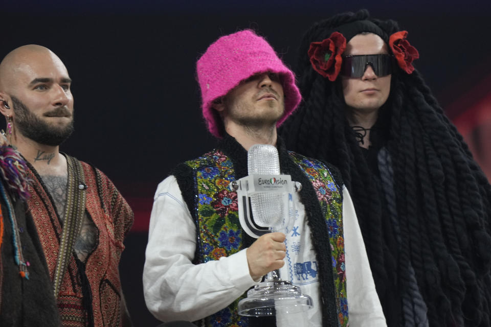 Members of the Kalush Orchestra from Ukraine celebrate after winning the Grand Final of the Eurovision Song Contest at Palaolimpico arena, in Turin, Italy, Saturday, May 14, 2022. (AP Photo/Luca Bruno)