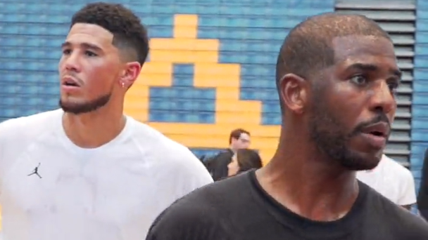 Aug. 28, 2022; Phoenix Suns guards Chris Paul and Devin Booker speak to attendees at Chris Paul Elite Guard Camp in Los Angeles.