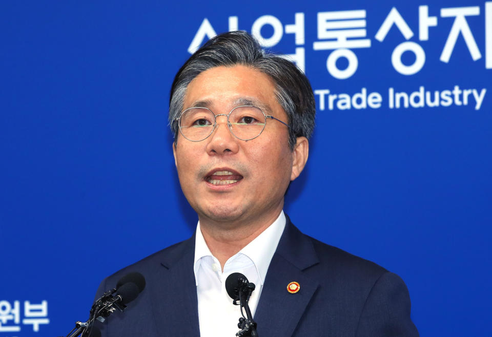 South Korean Trade Minister Sung Yun-mo speaks during a press conference at the government complex in Sejong, South Korea, Monday, Aug. 12, 2019. South Korea says it has decided to remove Japan from a list of nations receiving preferential treatment in trade in what was seen as a retaliatory move to Tokyo's recent decision to downgrade Seoul's trade status. (Jin Sung-chul/Yonhap via AP)