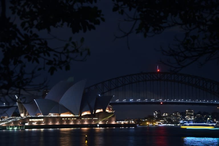 Sydney Harbour Bridge and the Opera House went dark for an hour Saturday to kick off a global campaign to raise awareness about the impacts of climate change