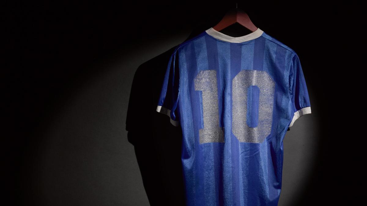 Diego Maradona's 'hand of god' shirt breaks two records at auction