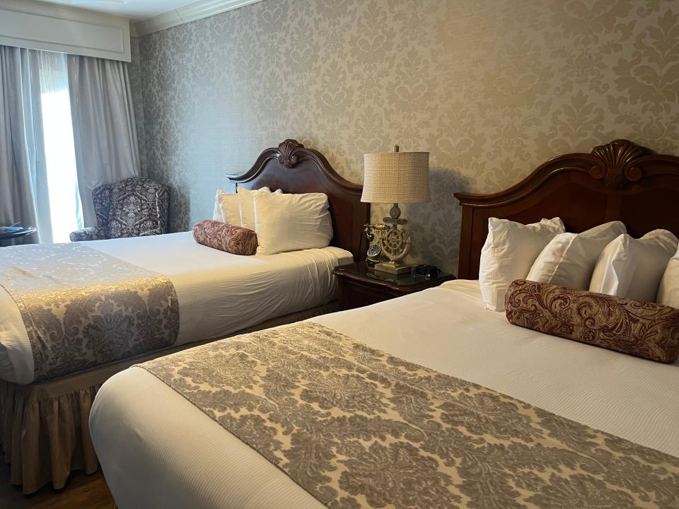 shot of two queen beds in a room at the fulton steamboat inn