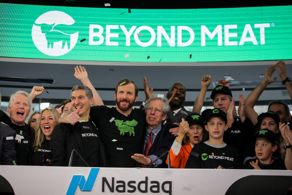 Ethan Brown, founder and CEO of Beyond Meat, and guests ring the opening bell to celebrate his company's IPO at the Nasdaq Market site in New York, U.S., May 2, 2019. REUTERS/Brendan McDermid