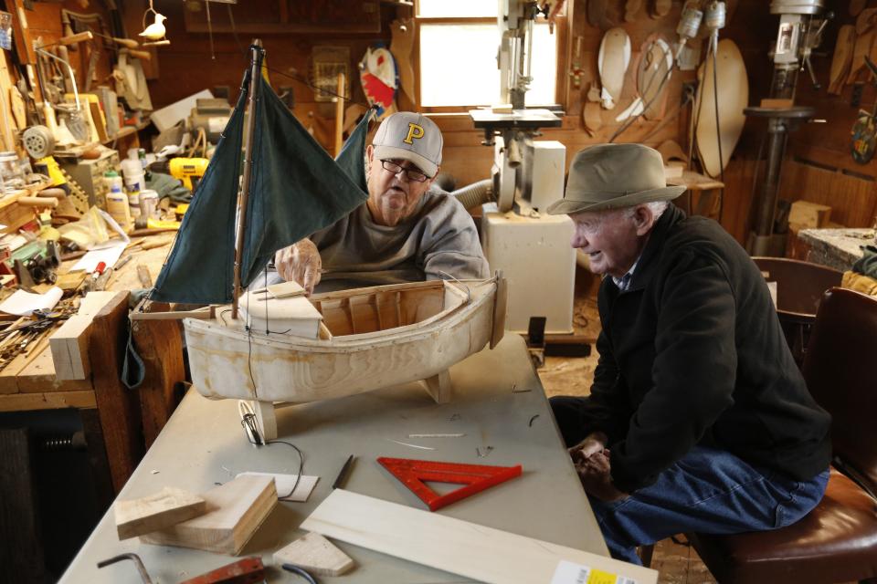 Friends build a model boat in Marshall's workshop in the neighboring village Sanford on Virginia's Eastern Shore