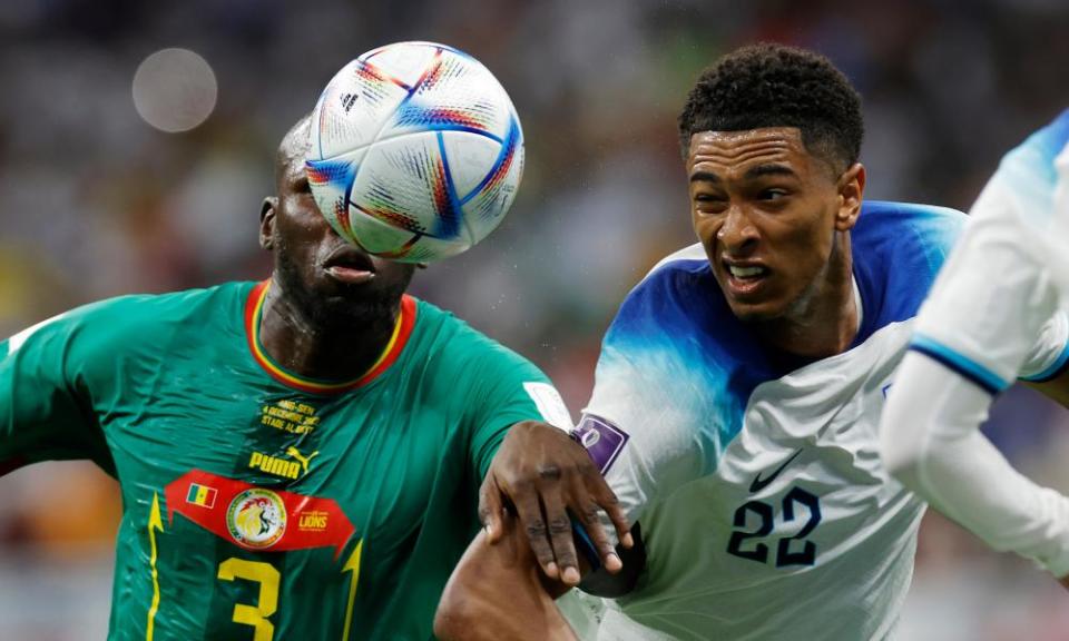 Jude Bellingham battles Senegal’s captain, Kalidou Koulibaly, for the ball