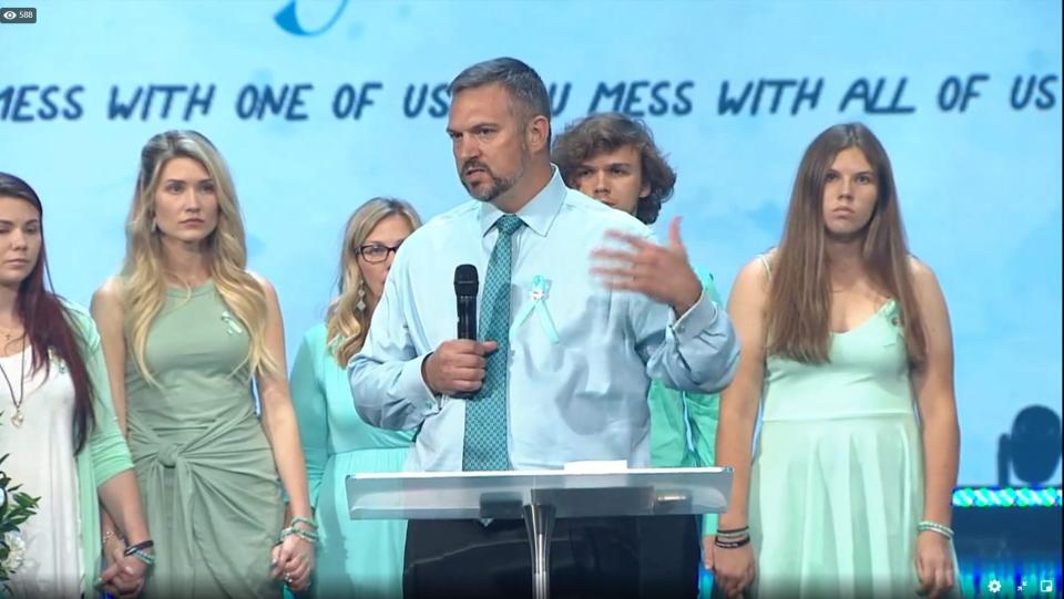 Forrest Bailey, father of Tristyn Bailey, addresses attendees at a celebration of life honoring Tristyn Tuesday, May 18, 2022, at Celebration Church in Jacksonville.