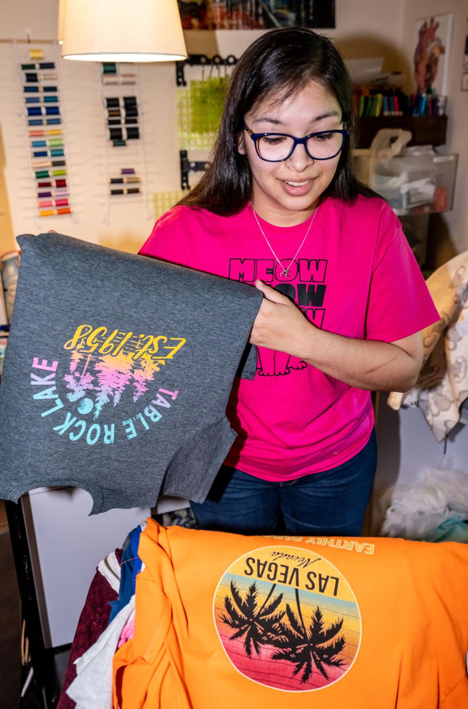 Natalie Stremlau of Oak Creek often uses T-shirts for quilts, giving her craftwork a personalized feel as seen on Sunday, May 21, 2023.