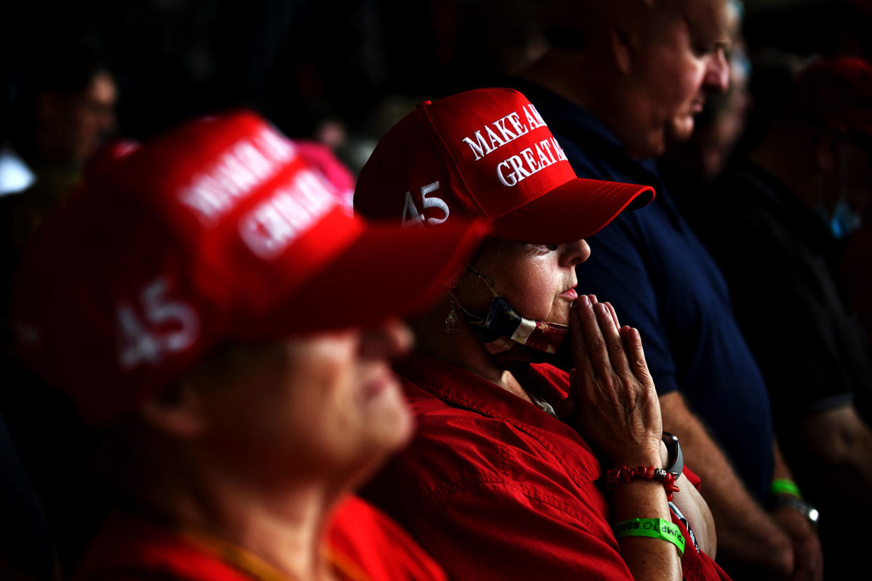 Trump supporters praying Jeff Swensen/Getty Images
