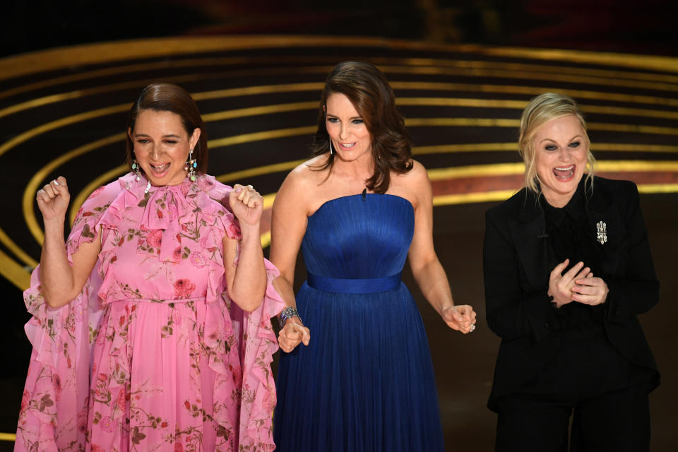 Maya Rudolph, Tina Fey and Amy Poehler speak onstage during the 91st annual Academy Awards. (Photo: Kevin Winter/Getty Images)