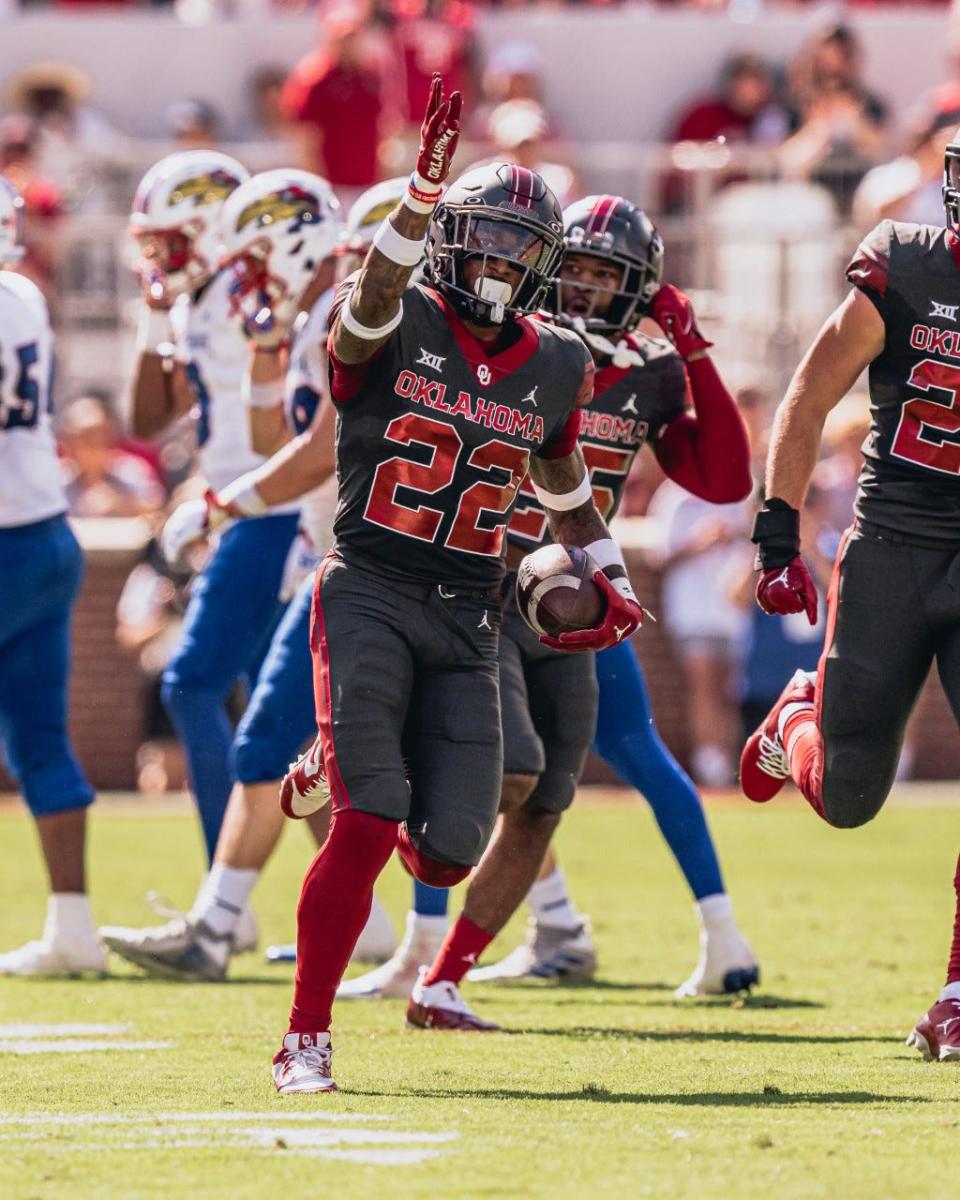 Oklahoma's CJ Coldon celebrates an interception during a 54-42 win over Kansas on Oct. 15, 2022, in Norman, Oklahoma.