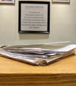 Lewandowski carries a thick file of letters, emails and other messages she has sent trying to call officials’ attention to the mounting mental health care needs in her schools.Photo by Rachel Hicks