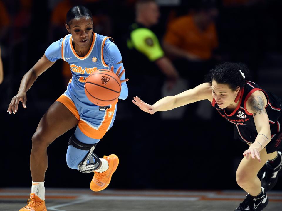 Tennessee's Jordan Walker (4) steals the ball from Georgia guard/forward Audrey Warren (31) during the NCAA college basketball game between the Tennessee Lady Vols and Georgia on Sunday, January 15, 2023 in Knoxville, Tenn. 