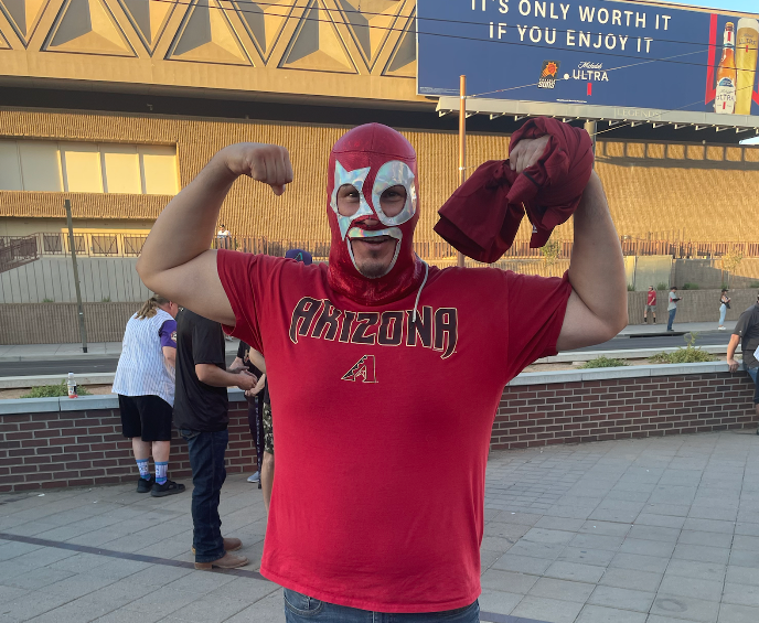 Gilberto Camacho, a wrestler that goes by the name “El Percherón,” poses for a photo outside of Chase Field on Thursday, Oct. 19, 2023.